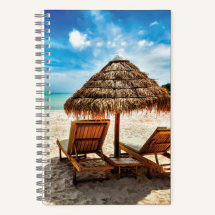 Lounge chairs on beach throw pillow notebook