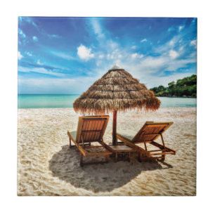 Lounge chairs on beach throw pillow tile