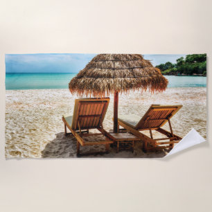 Lounge chairs on beach throw pillow towel
