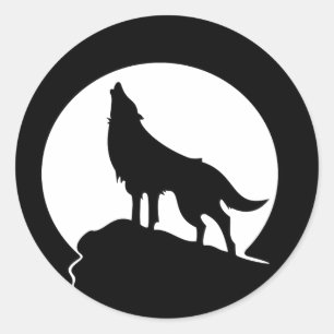 Loup hurlant avec un autocollant rond de pleine