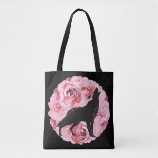 Loup noir avec le sac fourre-tout rose à roses