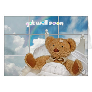 L'ours en peluche va bien bientôt avec l'arc-en-ci