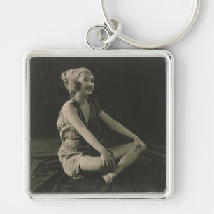 Love a Poor Maid Girl Sitting Cross Legs Keychain