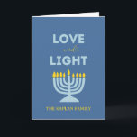 "Love and Light" Menorah Personalized Hanukkah Card<br><div class="desc">Send warm wishes for the Festival of Lights with this elegant "Love and Light" Hanukkah card. Featuring a glowing menorah design, a serene blue background, and customizable family text, this folded card is perfect for sharing heartfelt messages with loved ones. Whether you're celebrating all eight nights or sending blessings from...</div>