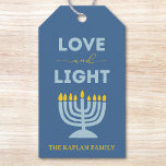 "Love and Light" Menorah Personalized Hanukkah Gift Tags<br><div class="desc">Add a meaningful touch to your Hanukkah gifts with these elegant "Love and Light" gift tags! Featuring a soothing blue background, a bright menorah illustration, and the uplifting message "Love and Light, " these tags are perfect for holiday presents, party favours, or festive decor. Customizable with your family name, they...</div>