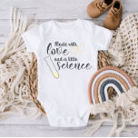 Love and Science IVF Quote Yellow Black Text Baby Bodysuit<br><div class="desc">Step into the world of adorable charm with our exclusive baby bodysuit, where the magic of creation is beautifully captured in this delightful design. Emblazoned with the heartwarming phrase "Made with Love and a Little Science, " this unique design unfolds a tale of joy and wonder for your little one....</div>