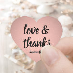 Love and Thanks Pink Rose Gold Faux Foil Thank You Heart Sticker<br><div class="desc">Add an elegant personalized finishing touch to thank you notes, party favours, and decorations with these chic calligraphy heart shaped stickers / envelope seals. Design features pretty pink rose gold faux metallic foil, stylish script love and thanks, and a name. All text on these versatile labels is simple to customize,...</div>