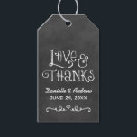 Love and Thanks Rustic Script Chalkboard Wedding Gift Tags<br><div class="desc">Charming chalkboard favour tags feature "Love and Thanks" with a custom wedding monogram in handwritten style fonts with a heart and scroll design accent that have a white chalk appearance. Background has a rustic black board textured appearance.</div>
