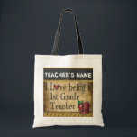 Love Being a 1st Grade Teacher | DIY Name Tote Bag<br><div class="desc">A unique rustic styled Tote Bag for a first grade teacher ready for you to personalize. ✔Note: Not all template areas need changed. 📌If you need further customization, please click the "Click to Customize further" or "Customize or Edit Design"button and use our design tool to resize, rotate, change text colour,...</div>