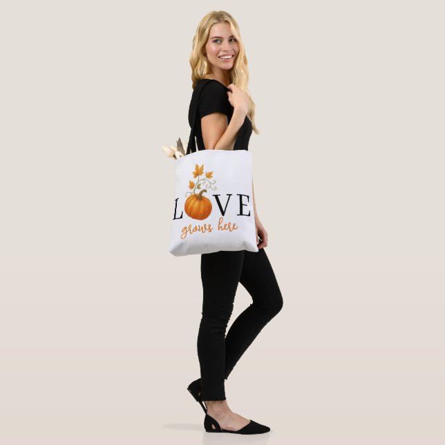 LOVE Grows Here | Pumpkin Lettering Autumn  Tote Bag (On Model)