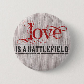 LOVE IS A BATTLEFIELD 2 INCH ROUND BUTTON
