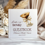 Love is Brewing Bow Espresso Martini Bridal Shower Guest Book<br><div class="desc">Celebrate the bride-to-be with this elegant coffee-themed bridal shower Guest Book. Featuring a watercolor espresso martini glass, a delicate beige bow, and modern typography, this design sets the tone for a stylish and cozy celebration. Perfect for coffee lovers, brunch showers, and fall or winter bridal events. Customize with your party...</div>