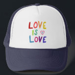 LOVE IS LOVE Colourful Rainbow Pride  Trucker Hat<br><div class="desc">Check out my shop for more pronouns, silly jokes, hiking, camping, vanlife, birds and lots more! You can also find this design on shirts, stickers, mugs, and buttons. Be sure to visit my shop for more designs too. Or if you'd like something custom please let me know. If you buy...</div>