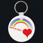 LOVE IS LOVE Rainbow Heart Keychain<br><div class="desc">Celebrate your Love and Pride with this Rainbow Forward exclusive LOVE IS LOVE design,  featuring our Classic Rainbow and a big red heart! Great gifts,  party favours,  wedding favours,  promotional items or stocking stuffers. Thanks for shopping Rainbow Forward,  and be sure to watch for more fab Pride designs!</div>