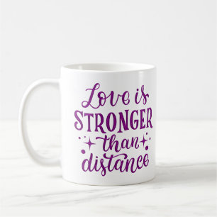 LOVE IS STRONGER THAN DISTANCE COFFEE MUG