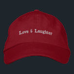 Love & Laughter Custom Text Charming Stylish Hat<br><div class="desc">Introducing the "Love & Laughter" Hat,  a charming and stylish accessory designed to celebrate the joyous union of love. 

Hat Colour: Red

You can customize the design.</div>