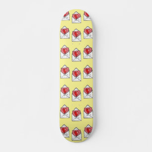 Love letters pattern on yellow skateboard