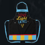 Love Light Latkes Black Hanukkah Funny Quote Apron<br><div class="desc">Love Light Latkes Black Hanukkah Funny Quote Apron is totally hipster cool! This colourful, humourous saying really stands out on the black starry-night background. Sure to make friends & Family smile. Includes a menorah icon and space for your name. Need help with this design? Want to see other colours or...</div>