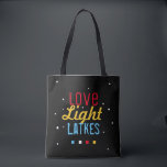 Love Light Latkes Funny Hanukkah Bright on Black Tote Bag<br><div class="desc">Practical and Fun- the perfect combination, This Love Light Latkes Black Hanukkah Funny Quote Tote will set a festive Chanukah tone wherever it goes this Holiday Season! Sure to make friends & family smile. The colourful, humourous saying really stands out on the black starry-night background. Includes space for your message...</div>