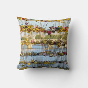 Love padlocks on a bridge in Paris Throw Pillow