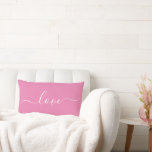 LOVE | Pink and White Reversible Lumbar Pillow<br><div class="desc">This custom throw pillow features a modern script font that reads "love", scrolled across both sides with inverse, reversible colours. Personalization, such as a name or message, can easily be added by clicking "customize further". Makes a great gift for Valentines Day, newlyweds or just to freshen up the decor. Other...</div>
