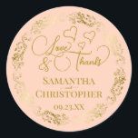 Love & Thanks Elegant Blush Peach & Gold Wedding Classic Round Sticker<br><div class="desc">These beautiful peach coloured stickers are designed to use as wedding favour tags, or as envelope seals for your wedding thank you cards. The elegant design features an ornate lacy golden border with fancy script lettering reading "Love & Thanks!" There are romantic hearts scattered about with room for the names...</div>