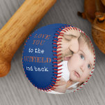 Love you to the Outfield and Back Blue Photo Baseball<br><div class="desc">Blue white and orange personalized baseball with two photos and lovely baseball quote from kids. The wording reads "love you to the outfield and back" and is lettered in hatched print and typewriter text. The photo template is set up ready for you to add your pictures and the year. The...</div>