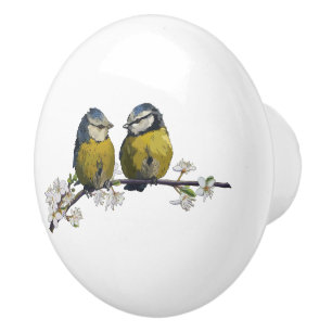 Lovebirds sitting on a cherry blossom branch white ceramic knob