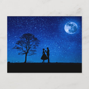 Lovers under a full moon holiday postcard