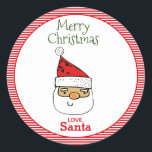 LoveSanta Whimsical Santa With Hat Christmas Classic Round Sticker<br><div class="desc">This festive Christmas sticker is perfect for gifts from Santa! Sticker features Santa's face with a red Santa hat and "Merry Christmas Love Santa" in whimsical typography on a red and white candy stripe background. Design by T.K. Goforth. Other items with this design can be found in my Vintage Red...</div>