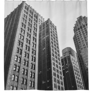 LOW ANGLE GRAYSCALE PHOTOGRAPHY OF HIGH-RISE BUILD