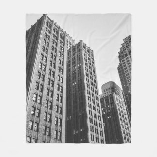 LOW ANGLE GRAYSCALE PHOTOGRAPHY OF HIGH-RISE BUILD FLEECE BLANKET