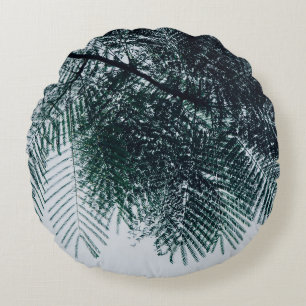 Low-angle photo of green tree round pillow