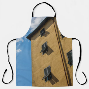 LOW ANGLE PHOTOGRAPHY OF BROWN LOUVER WINDOW APRON