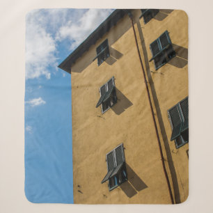 LOW ANGLE PHOTOGRAPHY OF BROWN LOUVER WINDOW SHERPA BLANKET