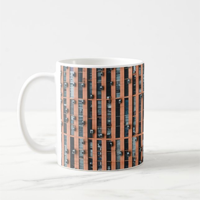 Low-angle photography of building coffee mug (Left)