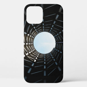 Low angle photography of missile silo hole iPhone 12 case