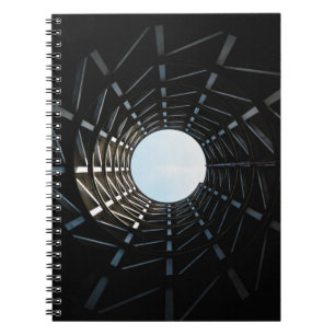 Low angle photography of missile silo hole notebook