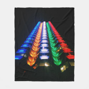 LOW-ANGLE PHOTOGRAPHY OF MULTICOLORED HIGH-RISE BU FLEECE BLANKET