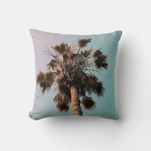 Low-angle photography of palm plant throw pillow