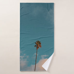 Low angle photography of palm tree under blue sky bath towel