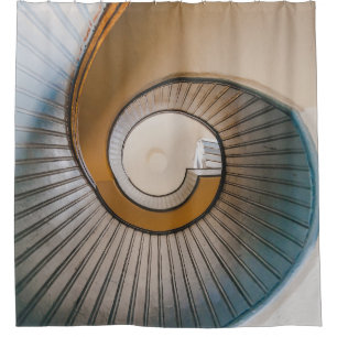 Low angle photography of spiral ladder
