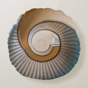 Low angle photography of spiral ladder round pillow