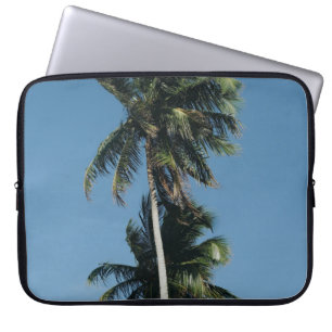 Low angle photography of three coconut trees laptop sleeve