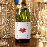 Lucky In Love Playing Card Couples Shower Favour Sparkling Wine Label<br><div class="desc">Elevate your couples shower with our custom 'Lucky In Love' bottle labels! Embrace the whimsy of a playing card-inspired design, adorned with iconic heart King and Queen symbols, all rendered in bold red, white, and black hues. Make a statement with personalized text, prominently featuring the endearing phrase 'Lucky In Love'...</div>