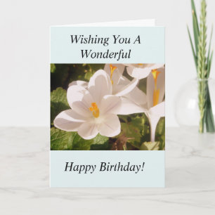 Lumière de fleur blanche et carte d'anniversaire