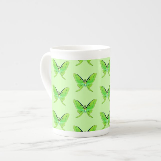 Luna moth on a pale green background bone china mug (Front Left)