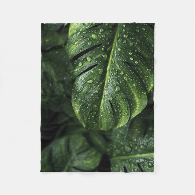 Lush Monstera Leaves with Morning Dew Drops Fleece Blanket (Front)