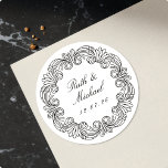 Luxurious Baroque Scroll Wedding Name & Date Classic Round Sticker<br><div class="desc">Enhance your event stationery and favours with these captivating custom stickers. This design features an exquisite circular border of ornate Baroque scrollwork, elegantly framing your personalized names and event date. These high-quality, peel-and-stick labels offer ultimate convenience, providing a polished and grand look in seconds for wedding seals, anniversary party favours,...</div>