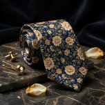 Luxurious Navy Blue Gold Floral Damask Tie<br><div class="desc">Exude timeless elegance with this sophisticated navy blue and antique gold floral design. Featuring intricately detailed blossoms in rich shades of gold and champagne set against a deep navy background, this pattern is inspired by classic Victorian and Baroque aesthetics. Perfect for formal weddings, gala events, or high-end business attire, this...</div>